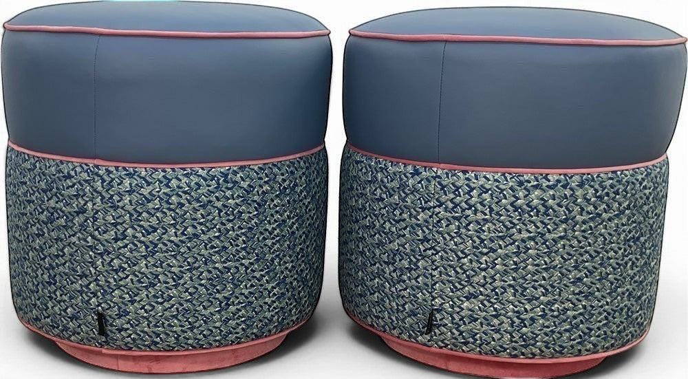 Pillowfina slate blue leather ottoman/stools with peacock woven lacing and watermelon velvet welt trim.