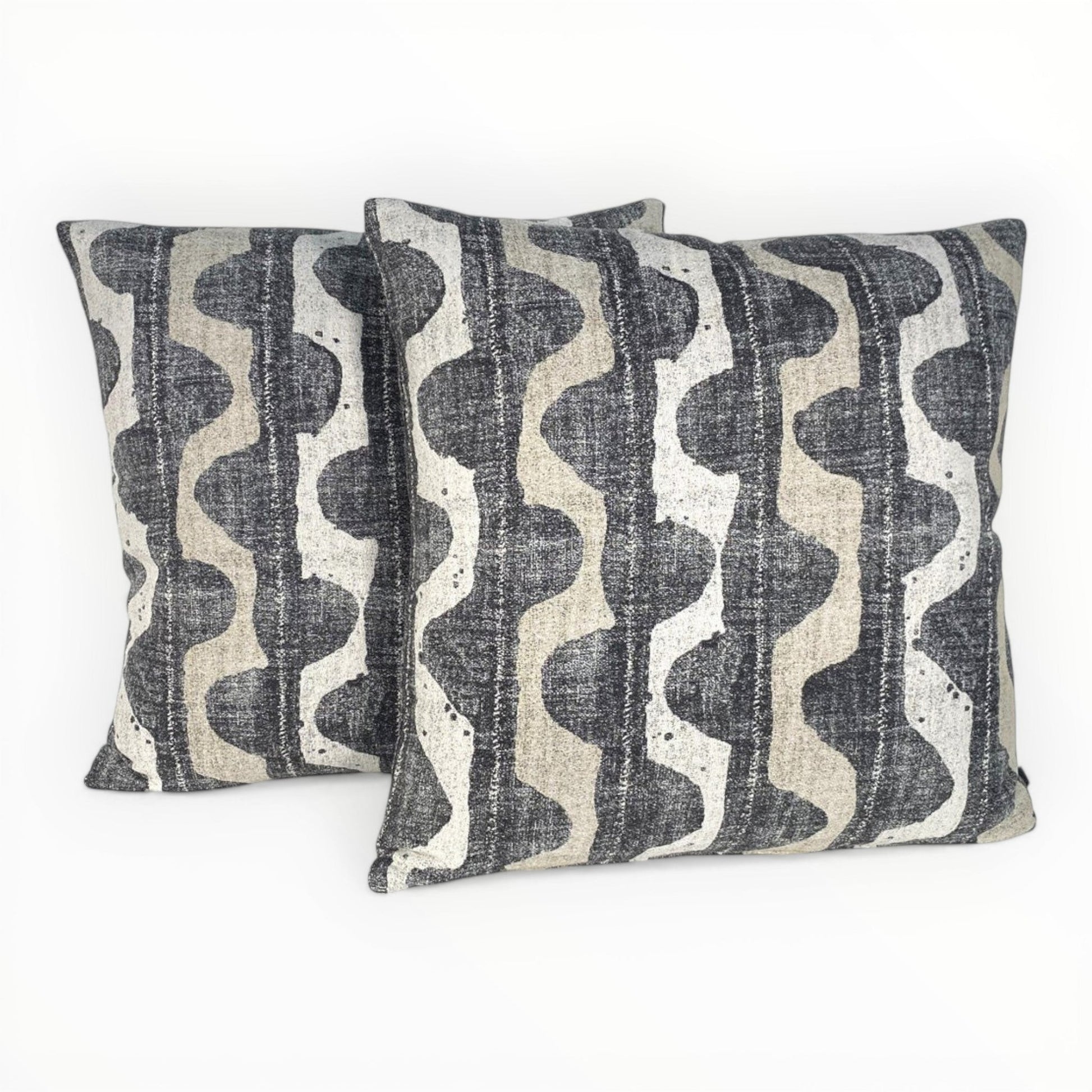 modern interior styled with neutral patterned pillow