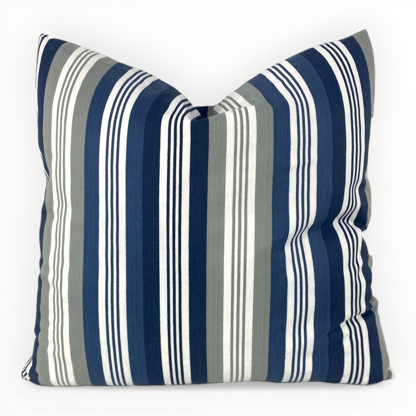 Coastal Impressions blue awning stripe throw pillow cover on neutral sofa