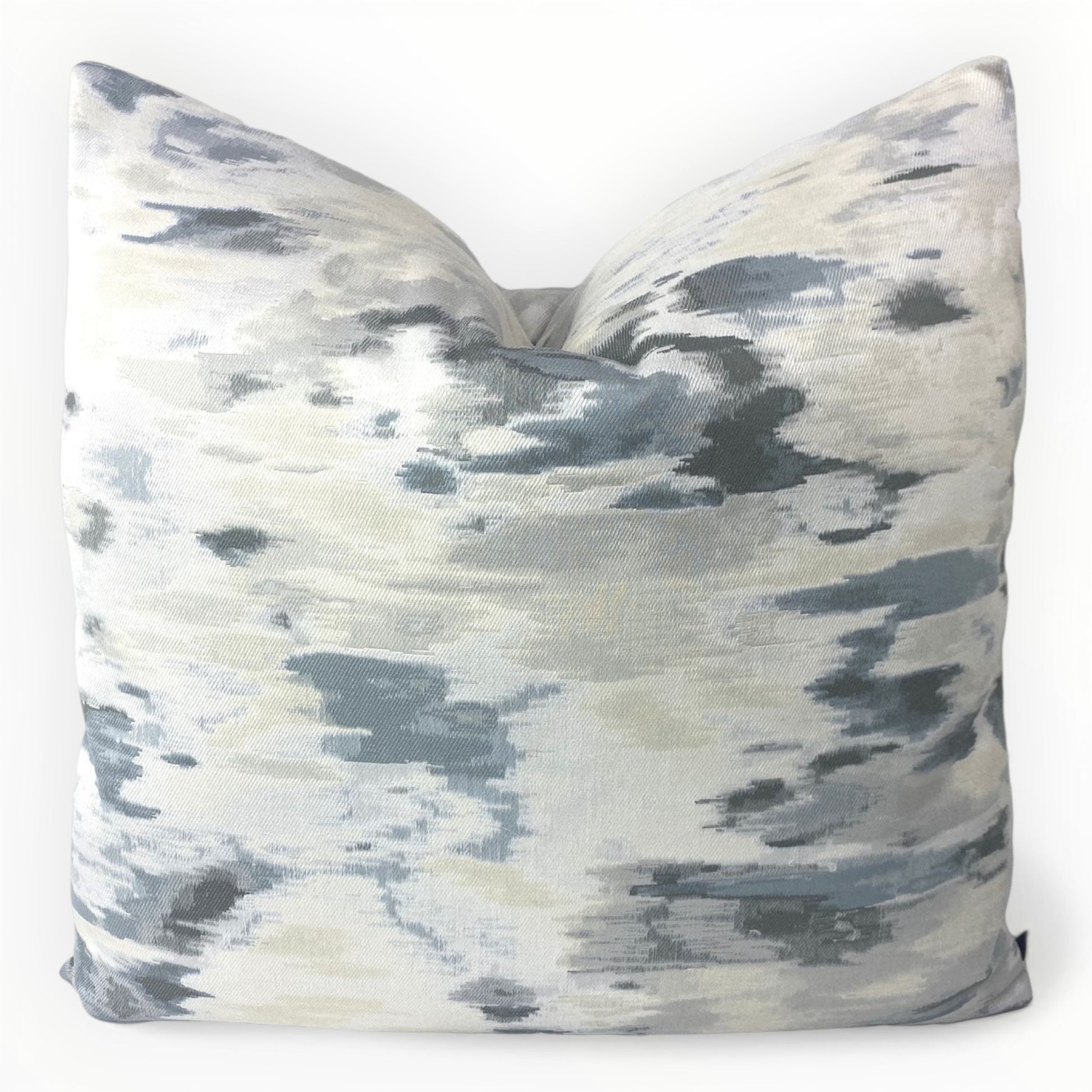 Coastal Impressions Clouds throw pillow cover on neutral sofa with abstract cloud pattern