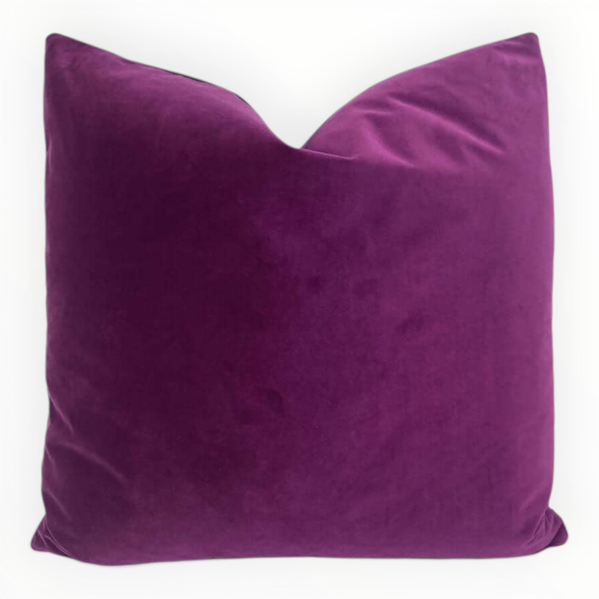 deep purple velvet throw pillow cover on neutral sofa