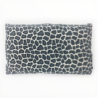 designer animal print throw pillow cover in slate blue tones on sofa