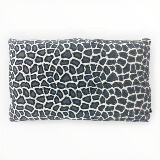 designer animal print throw pillow cover in slate blue tones on sofa