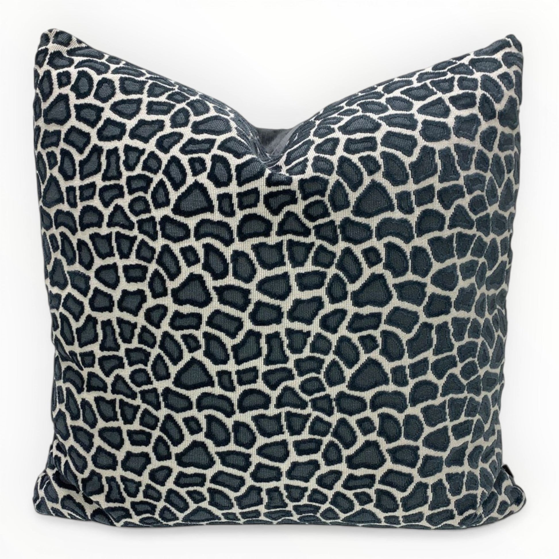 designer animal print throw pillow cover in slate blue on neutral sofa