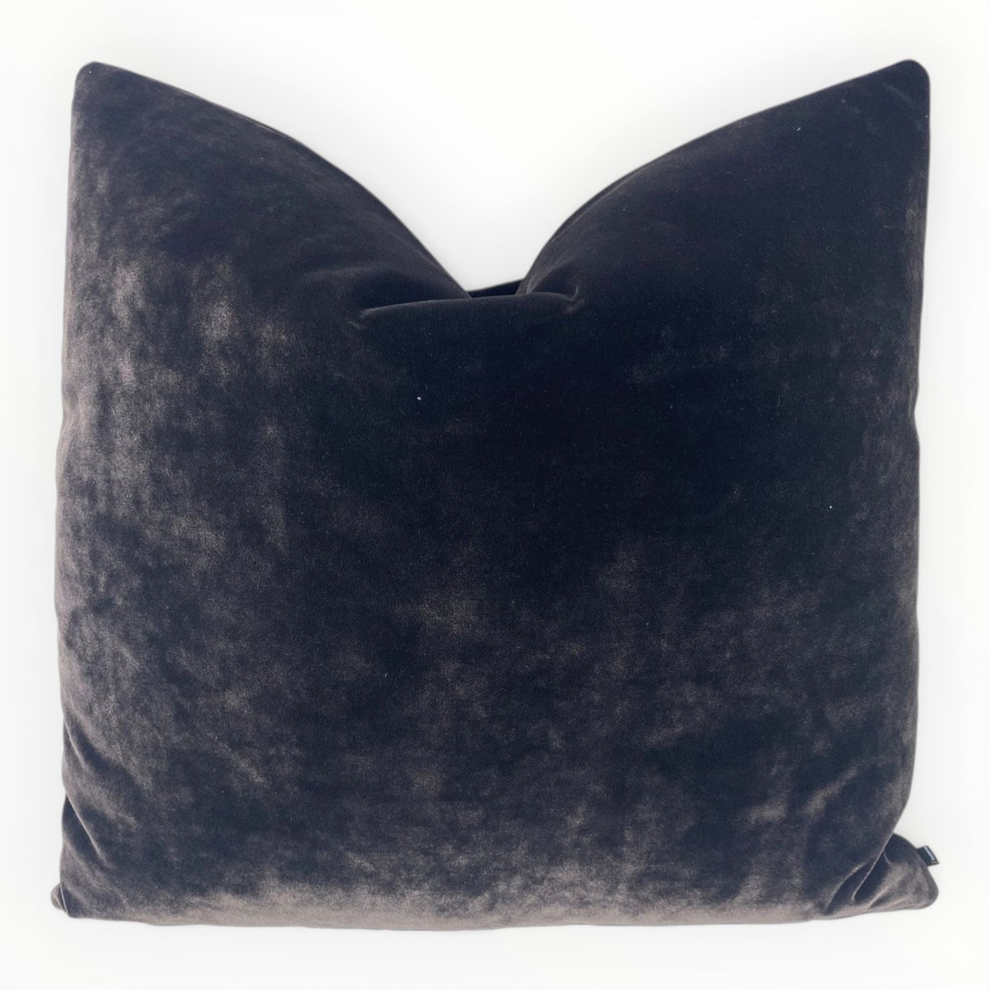 designer eggplant velvet throw pillow cover on neutral sofa