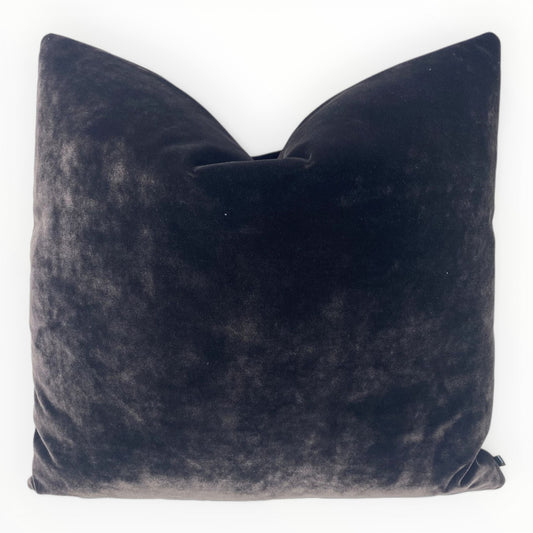 designer eggplant velvet throw pillow cover on neutral sofa