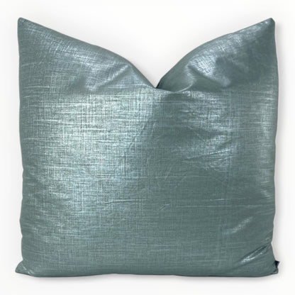 designer metallic linen teal throw pillow cover on neutral sofa