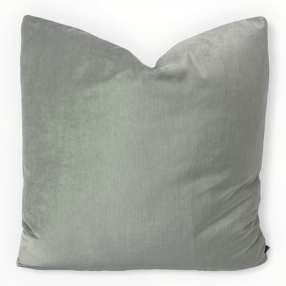 designer pale jade velvet throw pillow cover on neutral sofa