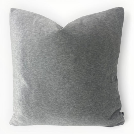 designer performance velvet throw pillow cover in storm gray on neutral sofa