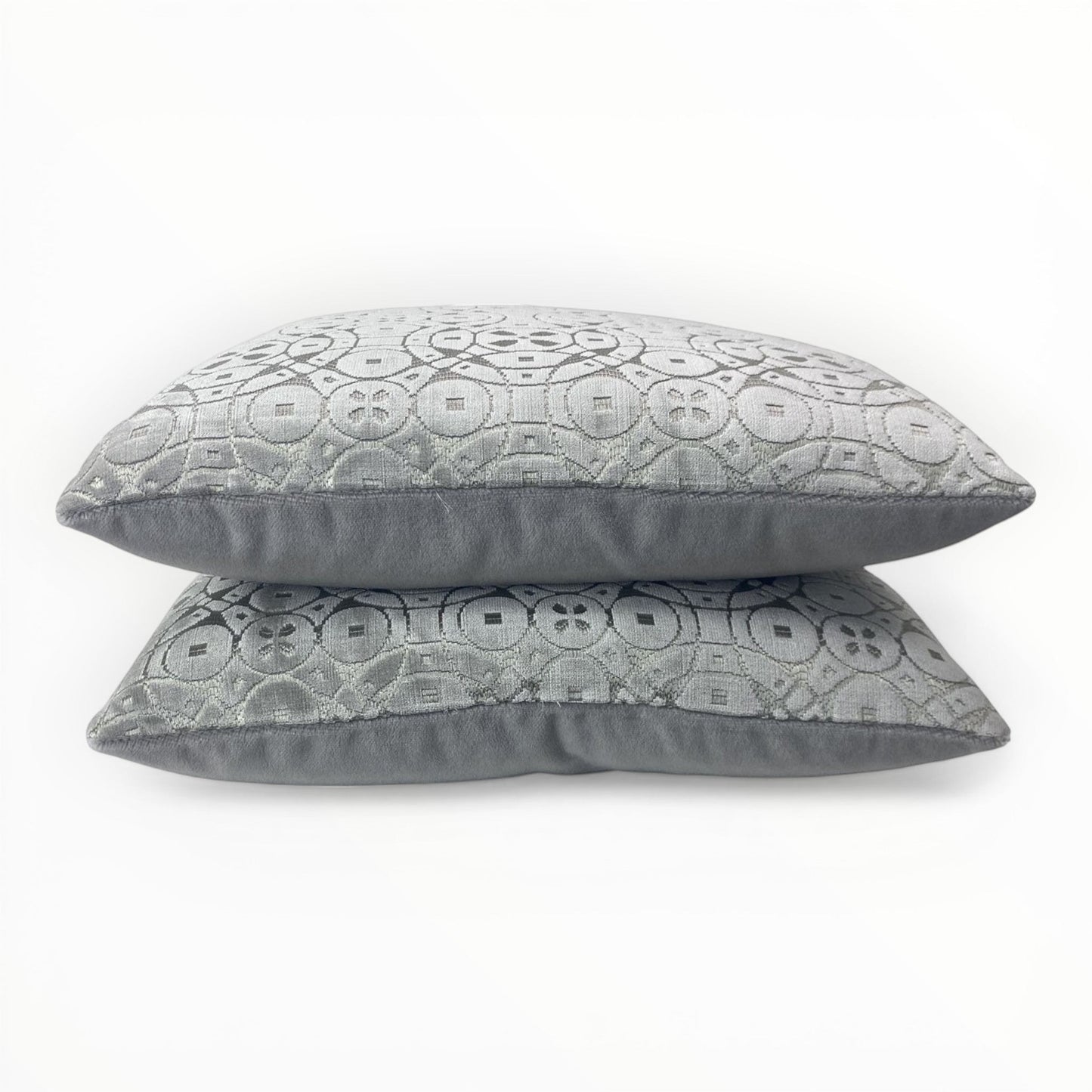 circular geometric velvet pillow in silver grey tones