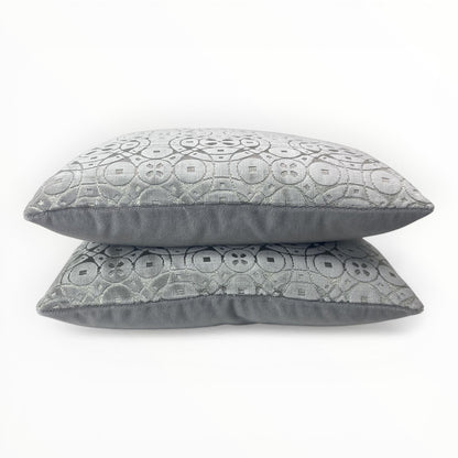 circular geometric velvet pillow in silver grey tones