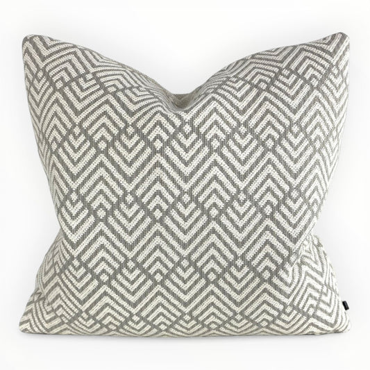designer taupe knit throw pillow cover on neutral sofa with textured pattern