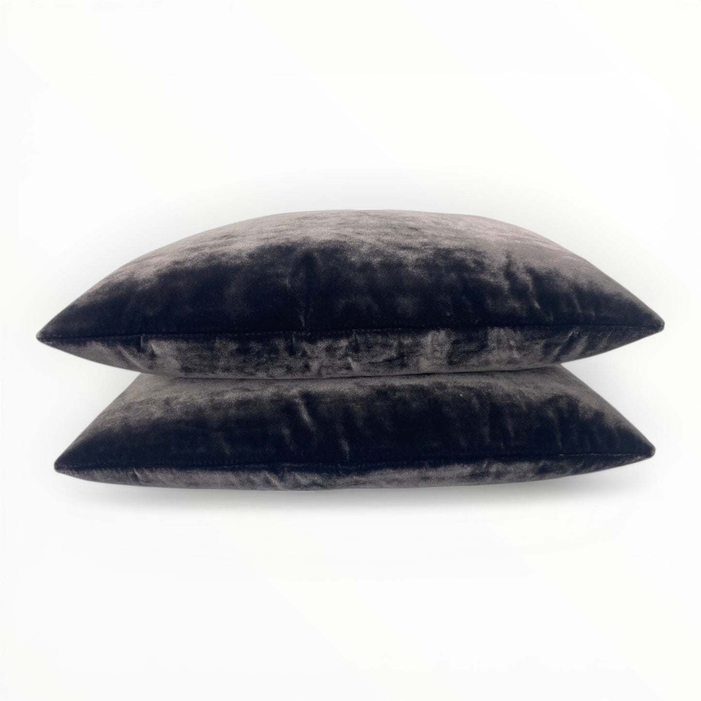 velvet fabric detail showing plush texture and subtle sheen in eggplant tone