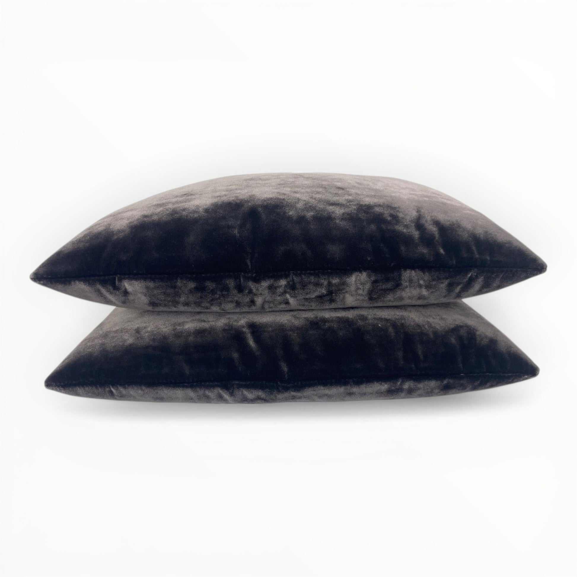 velvet fabric detail showing plush texture and subtle sheen in eggplant tone