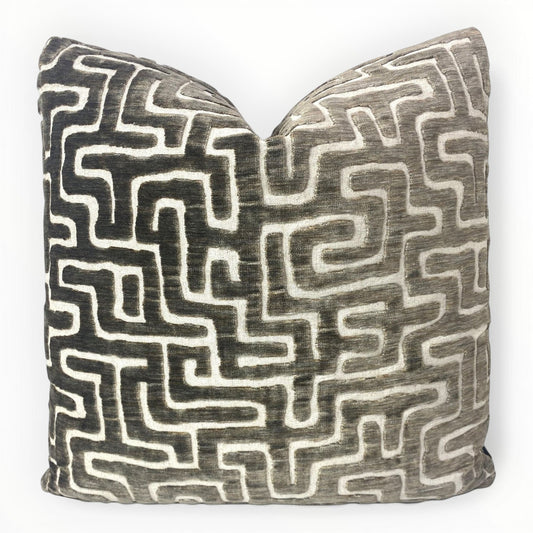 Fabricut Ebb & Flo Earth throw pillow cover on neutral sofa