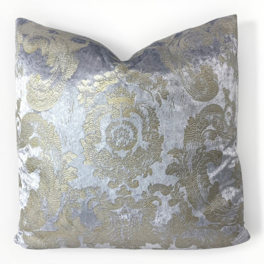 Gabriella damask throw pillow cover in sky blue and gold on neutral sofa