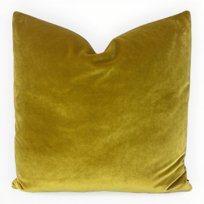 gold velvet throw pillow cover on neutral sofa