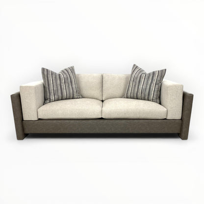 Ikat Stripe throw pillows shown on modern sofa