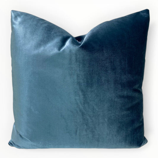 Jaclyn Smith Hollywood velvet throw pillow cover in admiral blue on neutral sofa