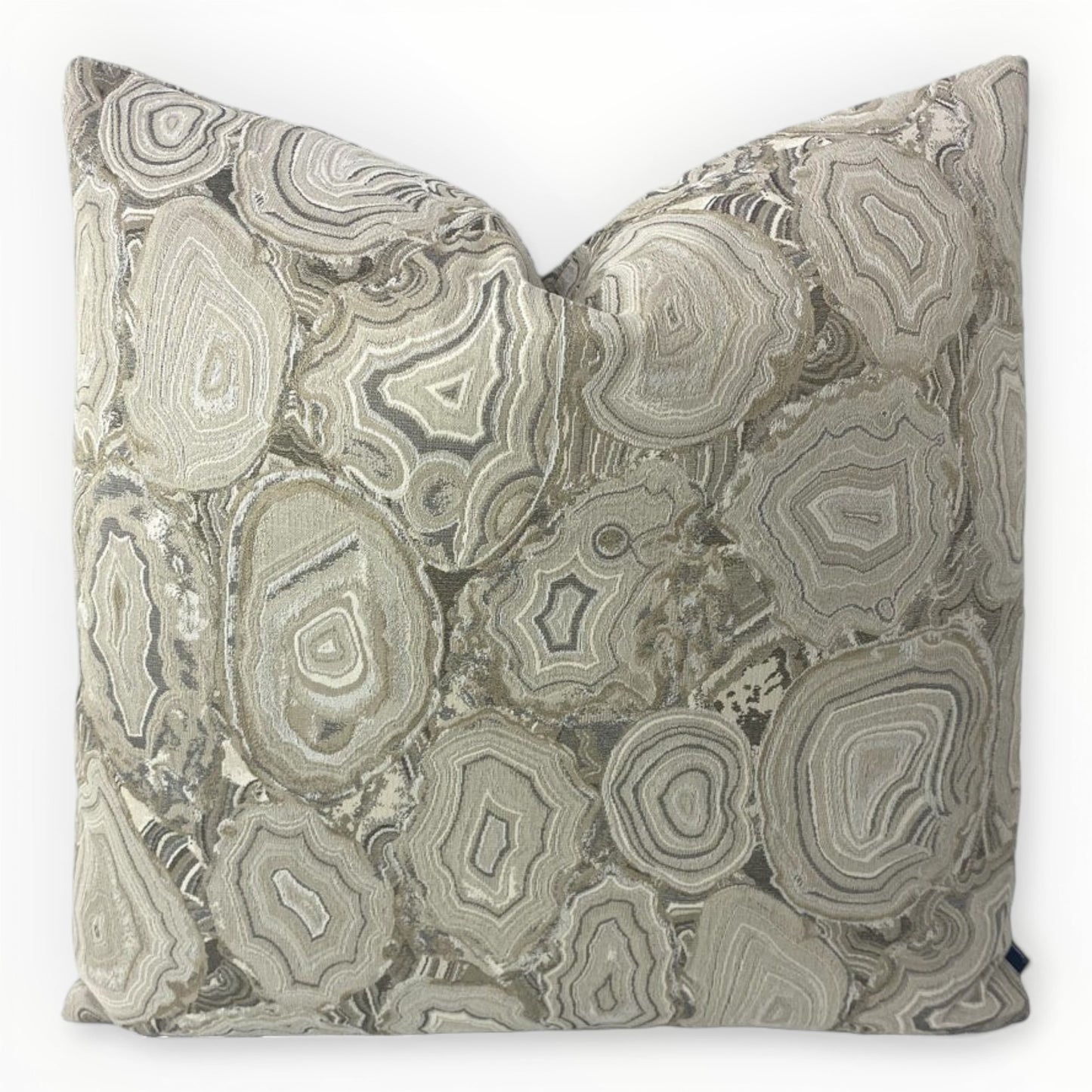JF Fabrics Hildegard throw pillow cover on neutral sofa