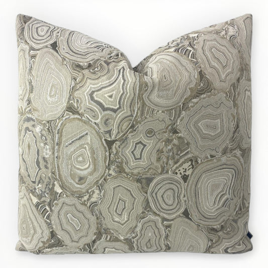 JF Fabrics Hildegard throw pillow cover on neutral sofa