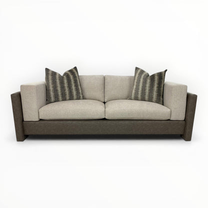 Kravet Couture Canyon Land Iron throw pillows shown on modern sofa