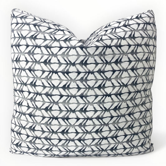 Lazar Bucca throw pillow cover in ink with geometric pattern on neutral sofa