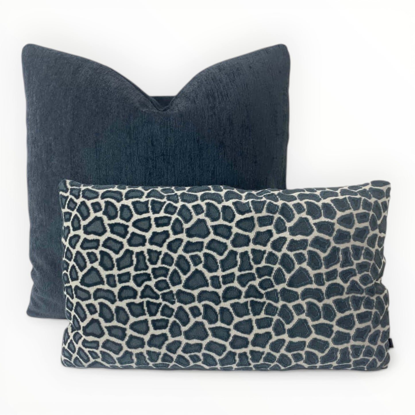 deep pile navy blue textured throw pillow paired with animal print lumbar pillow