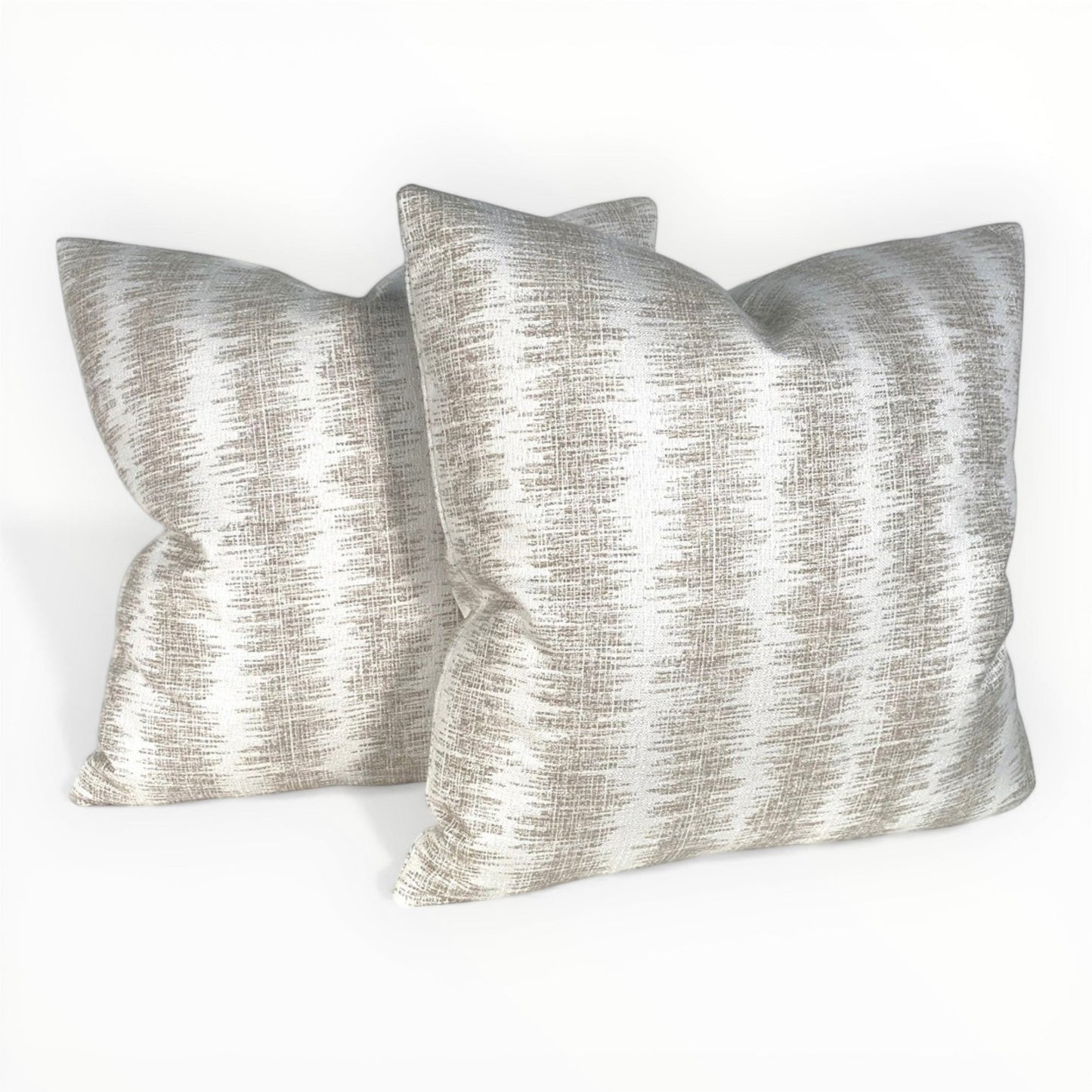 modern interior styled with neutral patterned pillow
