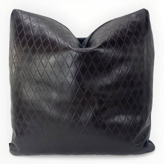 moore and giles diamond etched leather throw pillow on sofa
