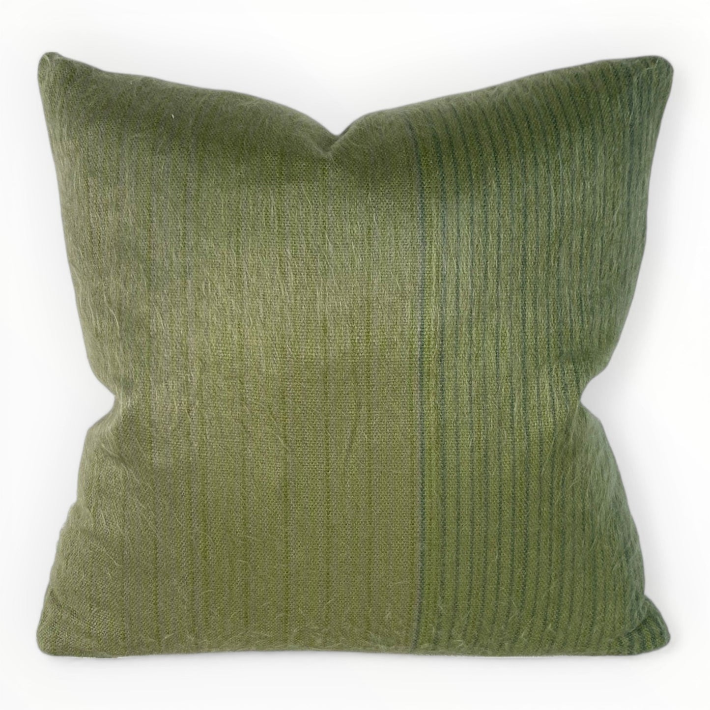 neutral interior styled with green textured pillow