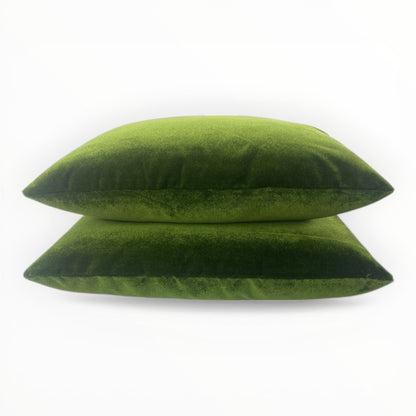 velvet fabric detail showing plush texture and subtle sheen in moss green