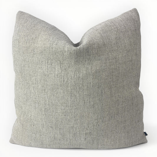 Moygashel Wilde linen throw pillow cover in natural on neutral sofa