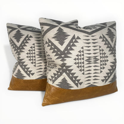 designer indoor outdoor pillow styled on neutral sofa