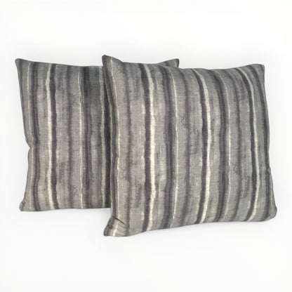 modern interior styled with taupe patterned pillow