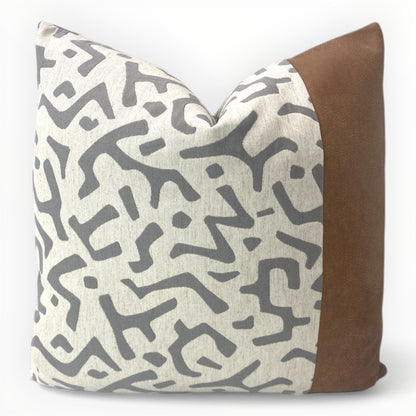 P Kaufmann Nara throw pillow cover with Italian leather border on neutral sofa