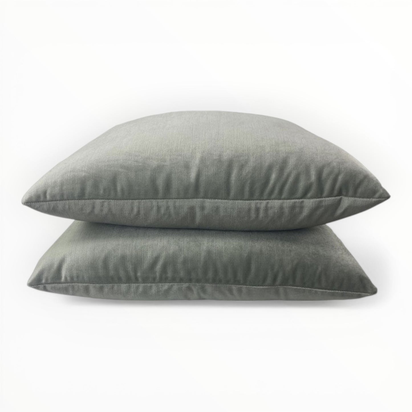 velvet fabric detail showing plush texture and light reflection in pale jade