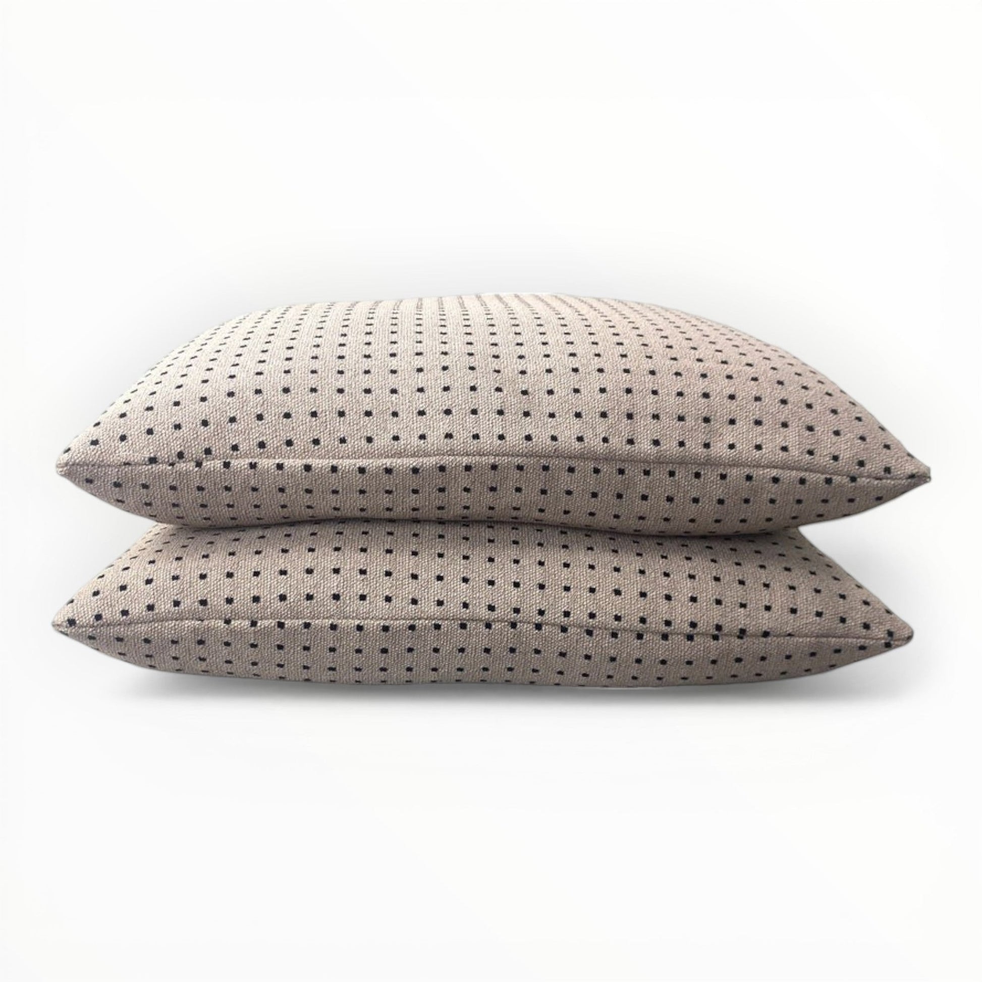 woven fabric detail showing geometric pixel pattern in black and neutral tones