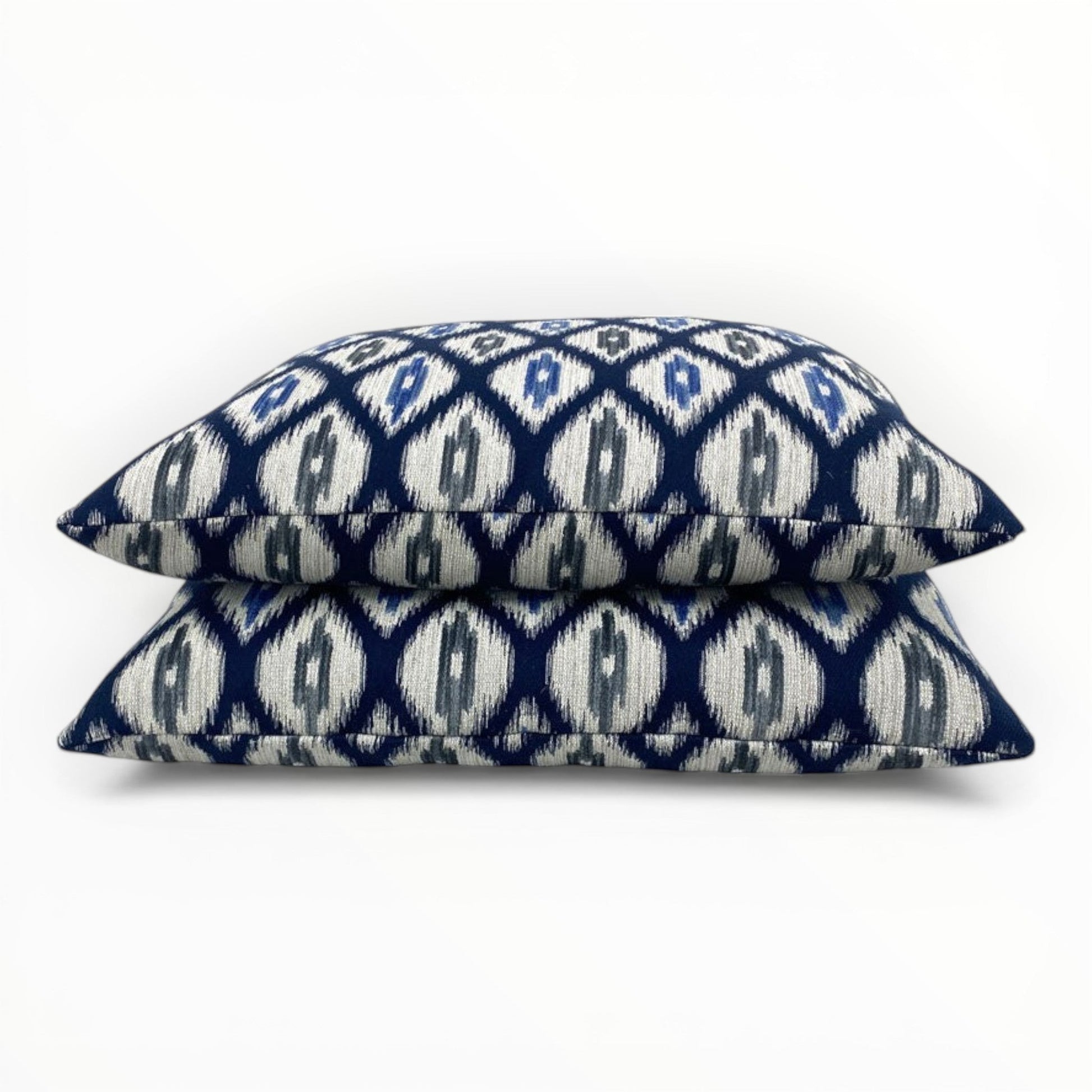 navy geometric throw pillow with textured woven pattern