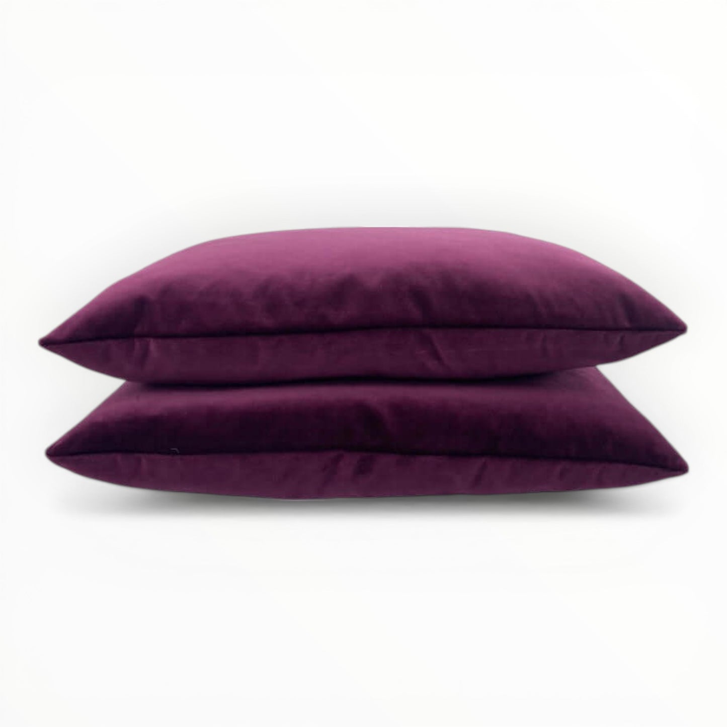 velvet fabric detail showing plush texture and subtle sheen in raspberry tone