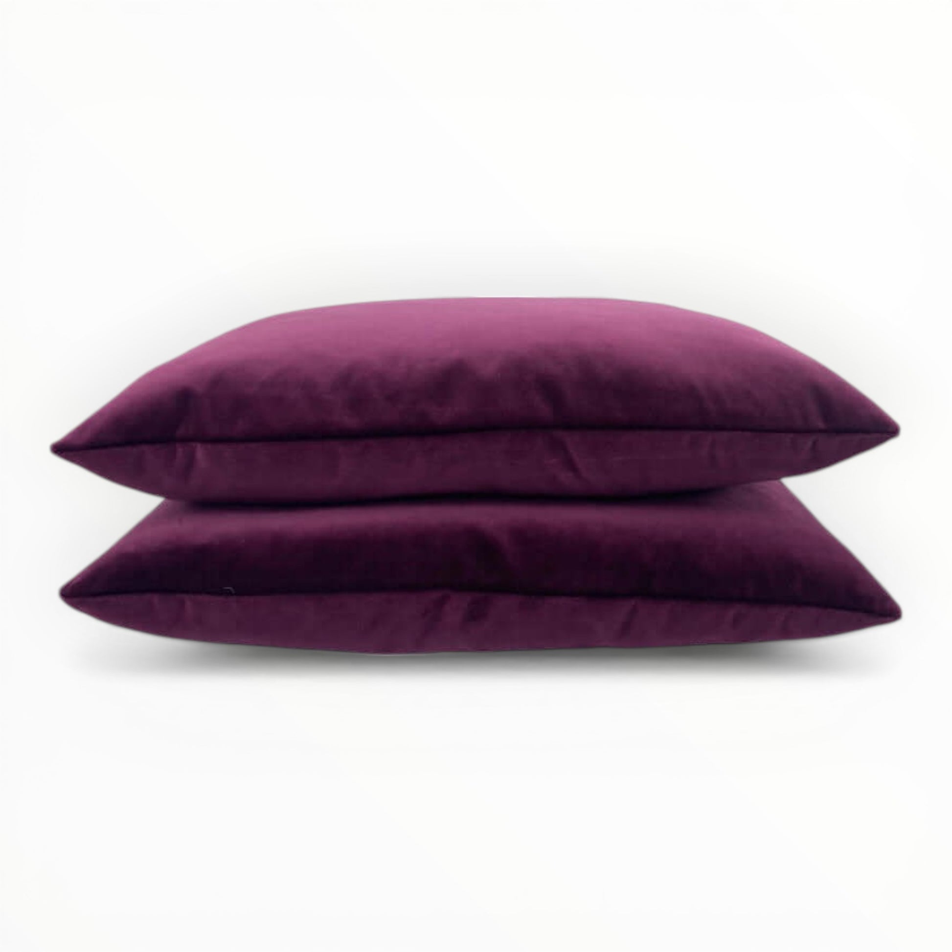 velvet fabric detail showing plush texture and subtle sheen in raspberry tone