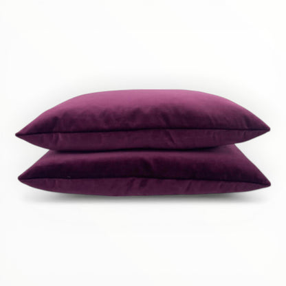 velvet fabric detail showing plush texture and subtle sheen in raspberry tone