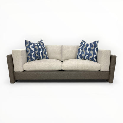 Robert Allen Lagan Azure throw pillows shown on a modern neutral sofa