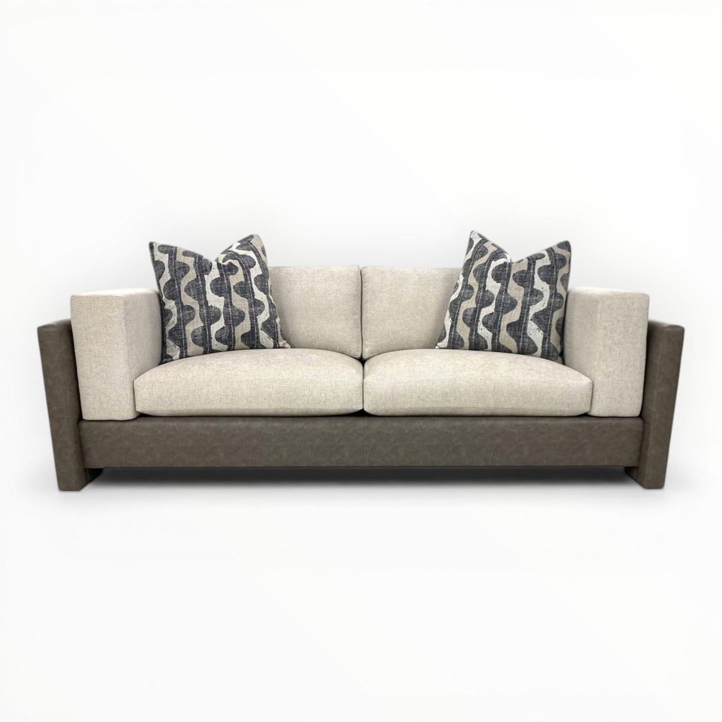 Robert Allen Lagan throw pillows shown on modern neutral sofa