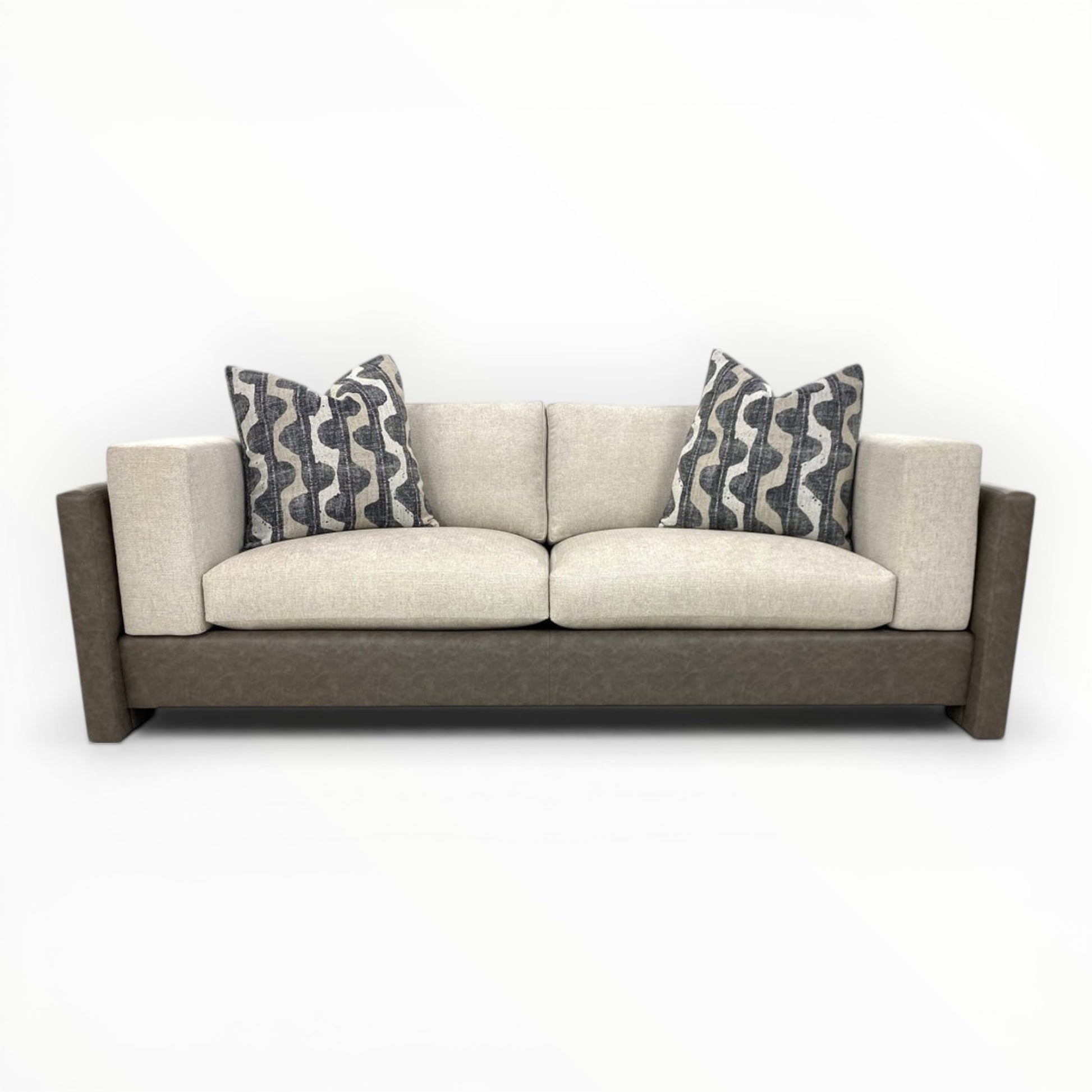 Robert Allen Lagan throw pillows shown on modern neutral sofa