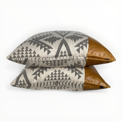 southwestern geometric outdoor pillow with saddle leather detail